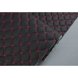 Прошитий шкірзам псевдо-перфорований "Ромб" чорний прошитий червоною ниткою, на поролоні 7мм, ширина 1,35м
